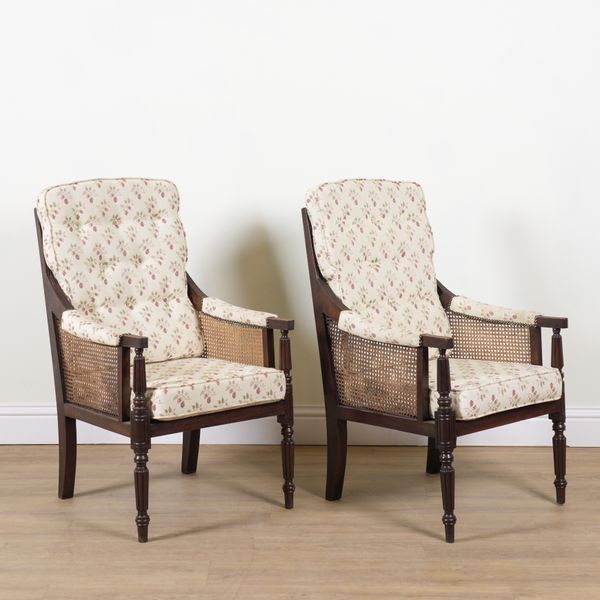 IN THE MANNER OF GILLOWS; A PAIR OF MAHOGANY FRAMED CANE LIBRARY CHAIRS (2)