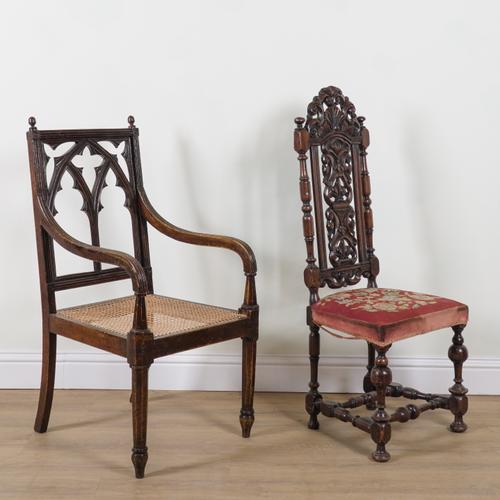 AN EARLY 20TH CENTURY STAINED BEECH FRAMED GOTHIC REVIVAL OPEN ARMCHAIR (2)