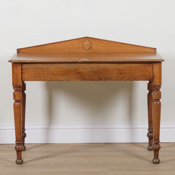 A VICTORIAN OAK GOTHIC REVIVAL SIDE TABLE