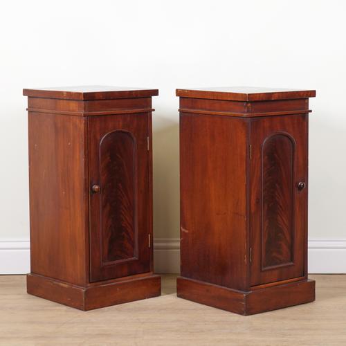 A PAIR OF MAHOGANY BEDSIDE CUPBOARDS (2)