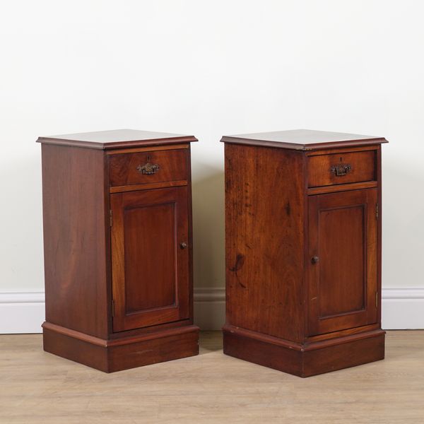 A PAIR OF MAHOGANY BEDSIDE CUPBOARDS (2)
