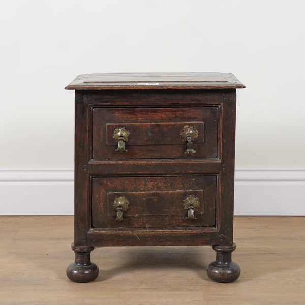 AN 18TH CENTURY OAK MINIATURE TWO DRAWER CHEST