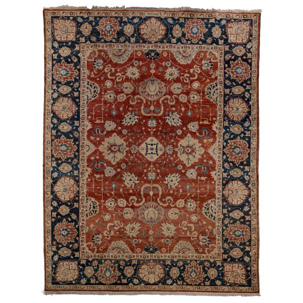 AN AFGHAN CARPET OF PERSIAN DESIGN