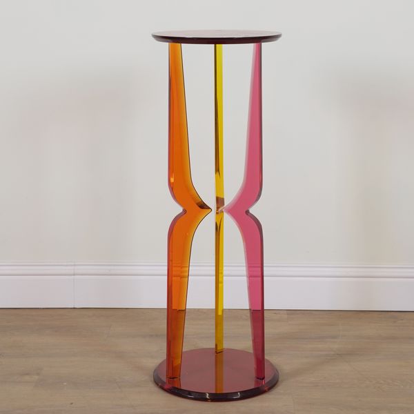 HAZIZA; AN ORANGE COLOURED ACRYLIC PEDESTAL