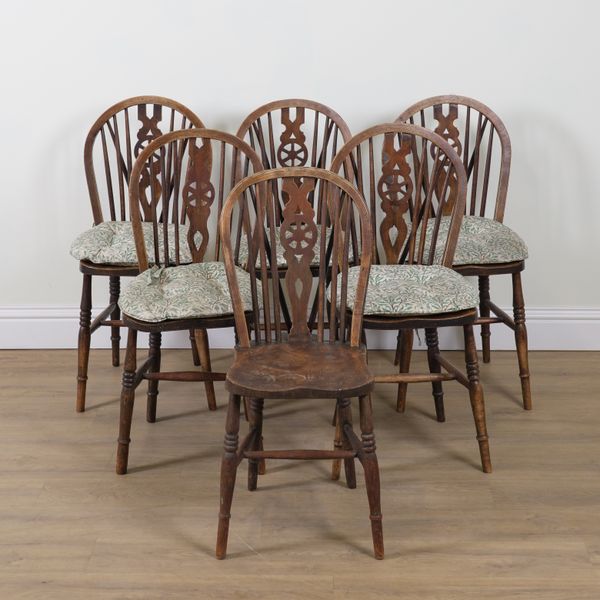 A SET OF SIX ASH AND ELM WHEELBACK DINING CHAIRS (6)