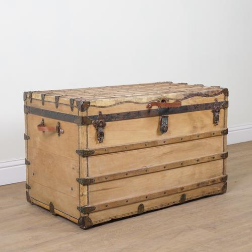 A LATE 19TH CENTURY PINE AND HIDE BOUND STEAMER TRUNK