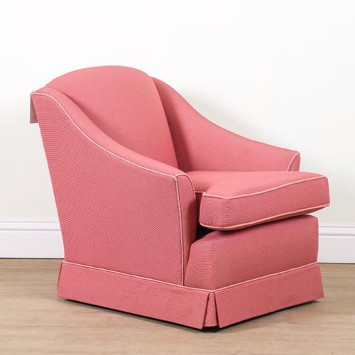A 20TH CENTURY UPHOLSTERED LOW ARMCHAIR