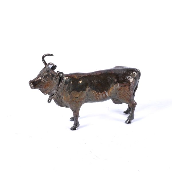 A LATE VICTORIAN  SILVER MODEL OF A STANDING COW