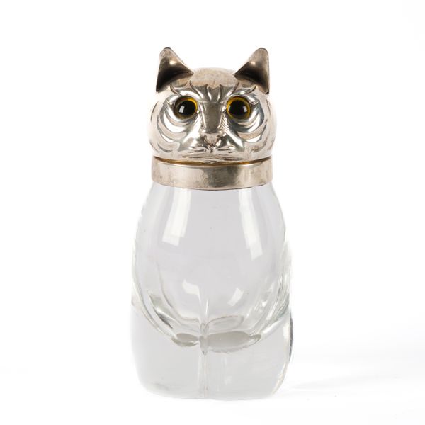 A VICTORIAN SILVER MOUNTED GLASS HINGE LIDDED SMELLING SALTS JAR