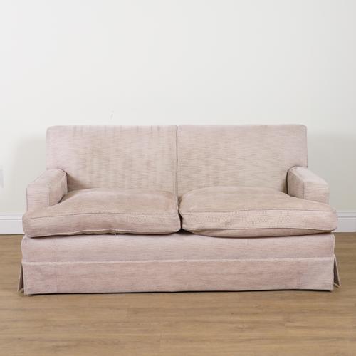 A MODERN PATTERN CREAM UPHOLSTERED TWO SEAT SOFA