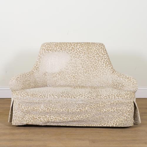 A 20TH CENTURY SHAPED BACK TWO SEAT SOFA