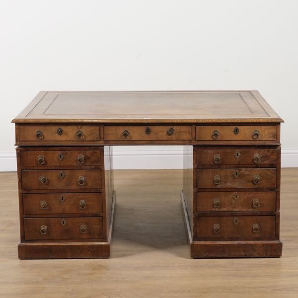 A 19TH CENTURY WALNUT PARTNER'S DESK