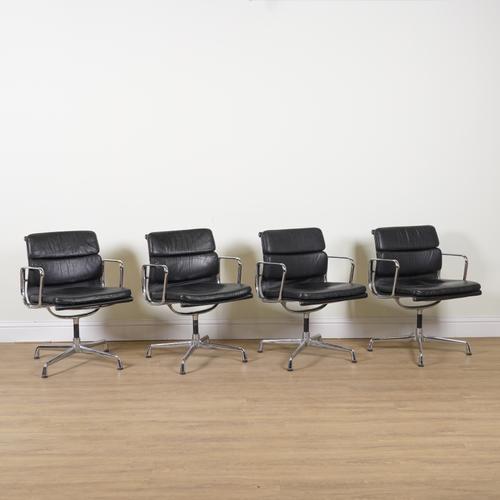 EAMES; A SET OF FOUR EA217 LEATHER UPHOLSTERED SWIVEL CHAIRS (4)