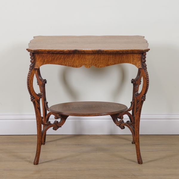 AN EDWARDIAN OAK TWO TIER OCCASIONAL TABLE