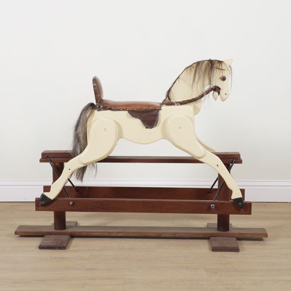 A PAINTED WOOD ROCKING HORSE
