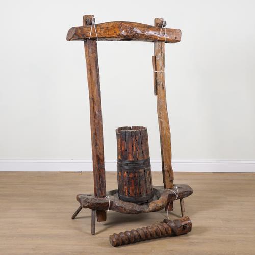 A HARDWOOD FREESTANDING FRUIT PRESS