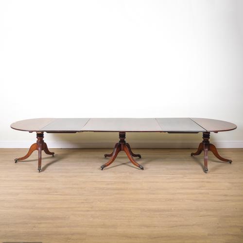 A GEORGE III AND LATER TRIPLE PILLAR MAHOGANY D-END EXTENDING DINING TABLE