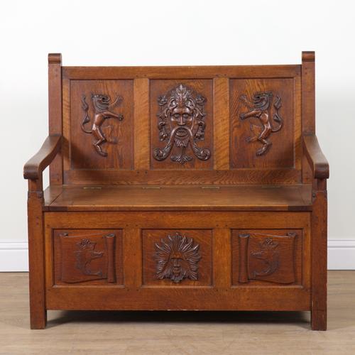 AN 18TH CENTURY STYLE OAK SETTLE