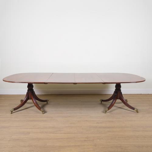 A GEORGE III AND LATER INLAID MAHOGANY D-END EXTENDING DINING TABLE
