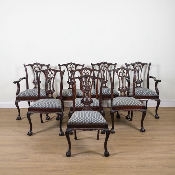 A SET OF EIGHT CHIPPENDALE REVIVAL CARVED HARDWOOD DINING CHAIRS (8)
