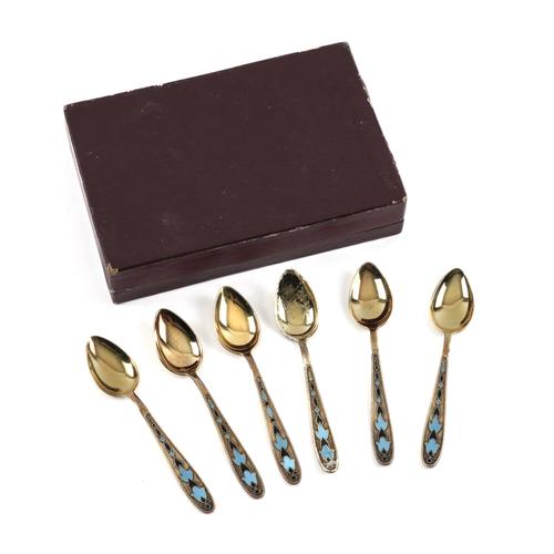A SET OF SIX RUSSIAN SILVER GILT AND CLOISONNE ENAMELLED TEASPOONS