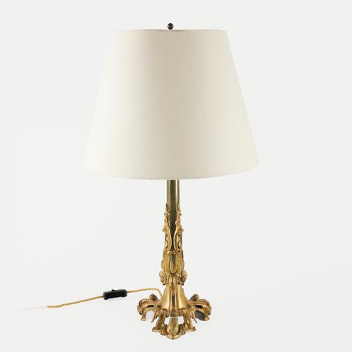 A ROCOCO REVIVAL GILT BRASS TABLE LAMP