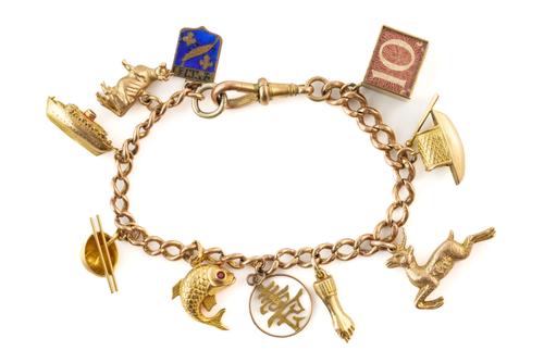 A CURB LINK CHARM BRACELET