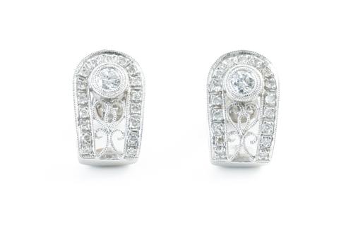 A PAIR OF DIAMOND SET EARRINGS, BOXED