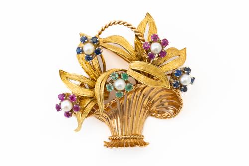 A GEMSET BASKET BROOCH