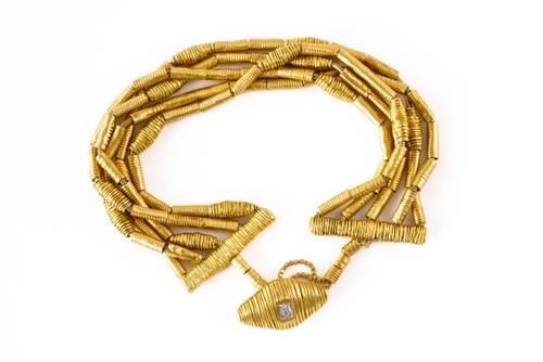 A GOLD AND DIAMOND BRACELET