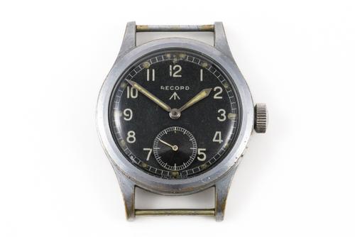 A STEEL BACKED AND PLATE BASE METAL FRONTED RECORD MILITARY WATCH
