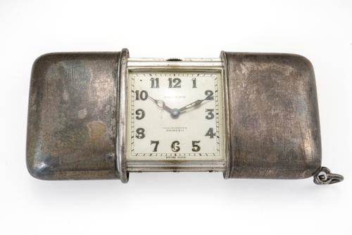 A MOVADO ERMETO SILVER CASED SELF-WINDING TRAVELLING WATCH