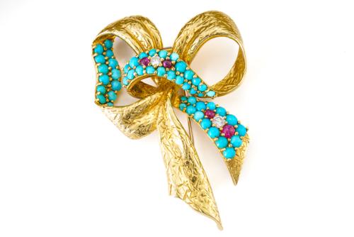 A KUTCHINSKY BOW BROOCH
