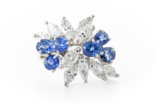A SAPPHIRE AND DIAMOND SPRAY RING