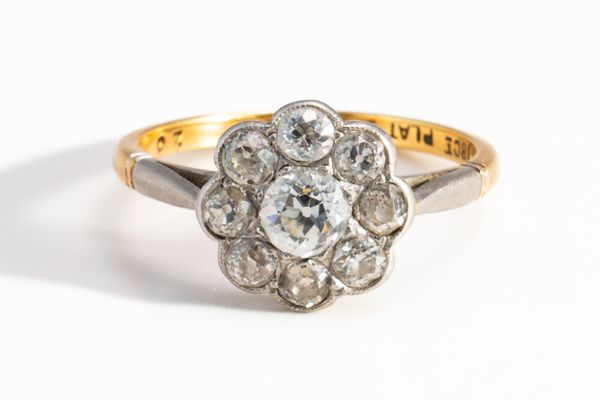 A GOLD AND PLATINUM DIAMOND CLUSTER RING, BOXED