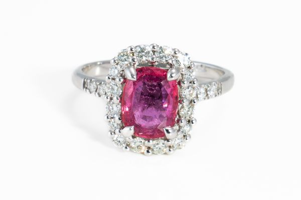 A PINK SAPPHIRE AND DIAMOND RING