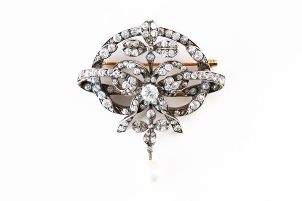 AN EDWARDIAN DIAMOND AND PEARL PENDANT BROOCH