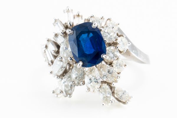 A SAPPHIRE AND DIAMOND RING