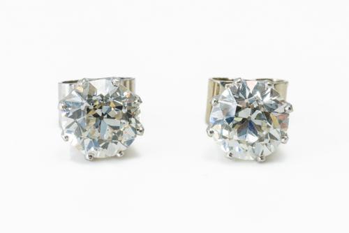 A PAIR OF OLD CUT DIAMOND STUD EARRINGS