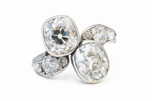 A BROKEN TWO STONE DIAMOND RING