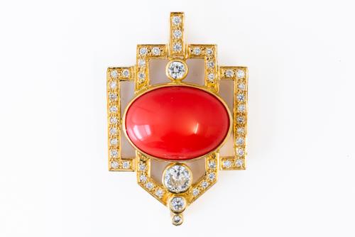 A CORAL AND DIAMOND PENDANT