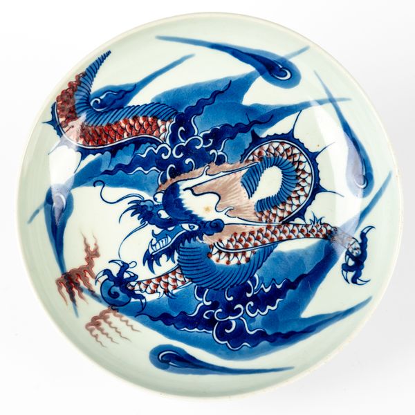 A CHINESE PORCELAIN `DIVING DRAGON' DISH