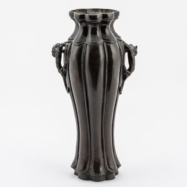 A CHINESE BRONZE TWO-HANDLED VASE