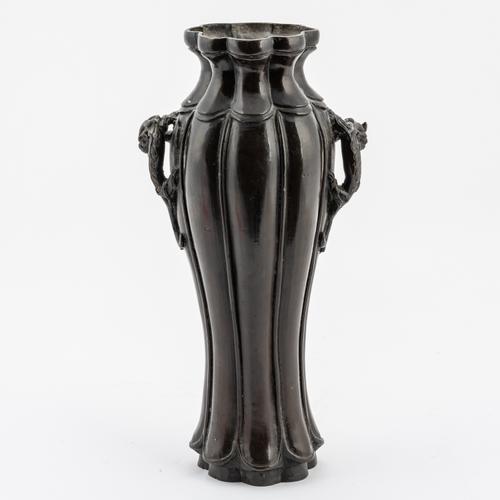 A CHINESE BRONZE TWO-HANDLED VASE