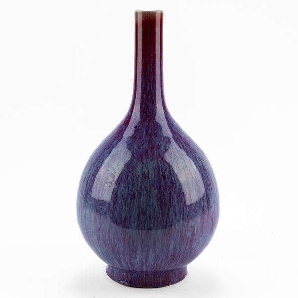 A TALL CHINESE FLAMBE-GLAZED PEAR-SHAPE BOTTLE VASE