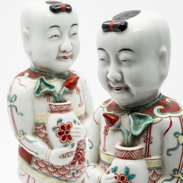 A PAIR OF LATE WUCAI-STYLE FIGURES OF SMILING BOYS, HEHE (2)