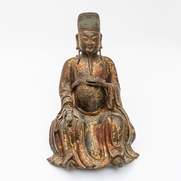 A CHINESE GILT-LACQUERED BRONZE FIGURE OF WENCHANG