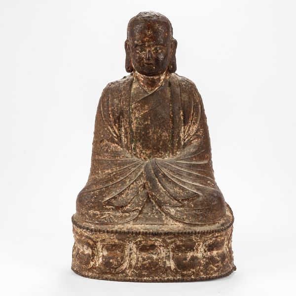 A LARGE CHINESE CAST IRON FIGURE OF A LUOHAN