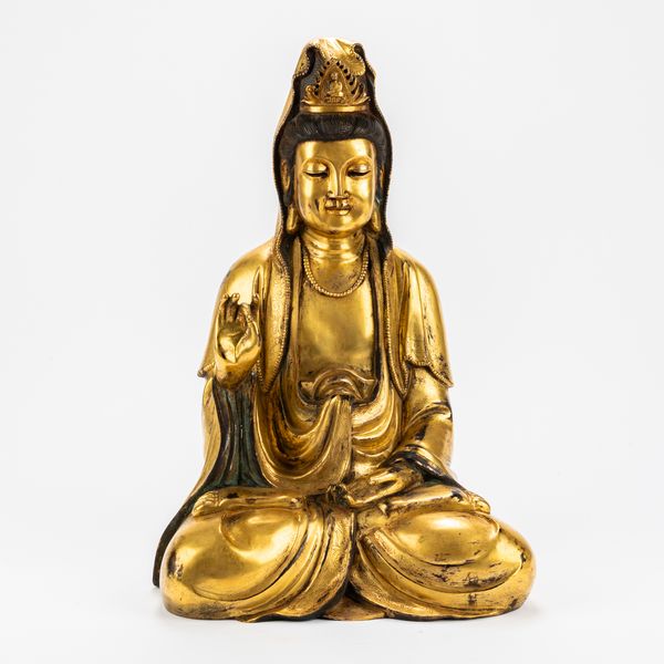 A LARGE CHINESE GILT BRONZE FIGURE OF GUANYIN