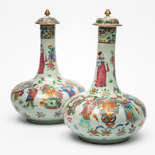 A PAIR OF CHINESE FAMILLE-ROSE BOTTLE VASES AND COVERS (4)